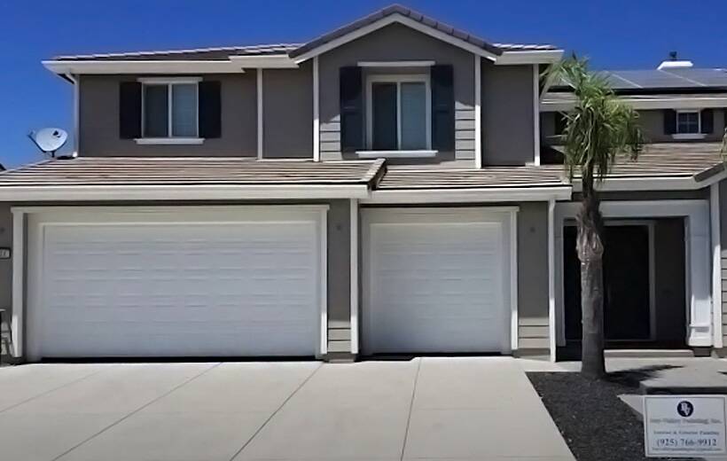 should I paint my garage door the same color as my trim?