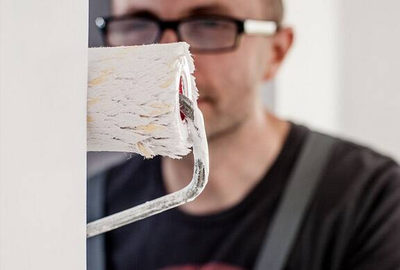 one of our pros is working on a room painting