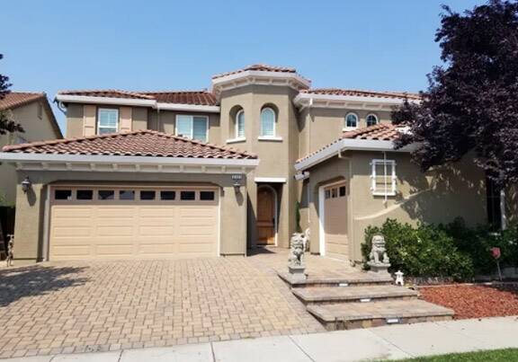 earth tone exterior paint with red clay roof