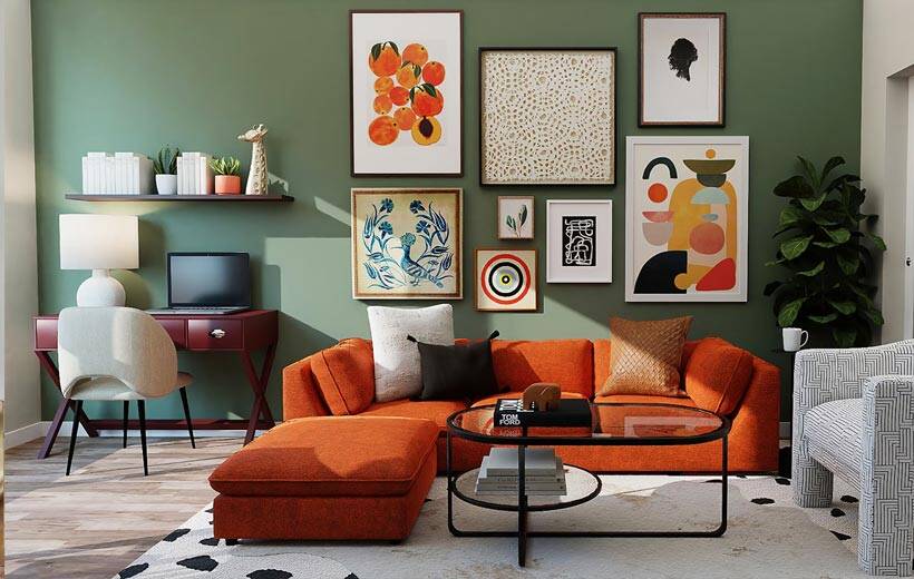 living room with olive green walls and orange accents