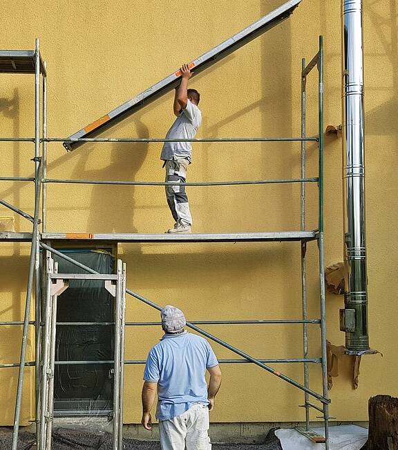 our team is adding the metal scaffolding to start the commercial painting on this property